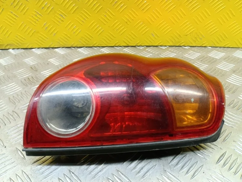 Фонарь задний левый Mitsubishi L200 (2006-2015) 2007 8330A155 ПИКАП 2.5 D 4D56