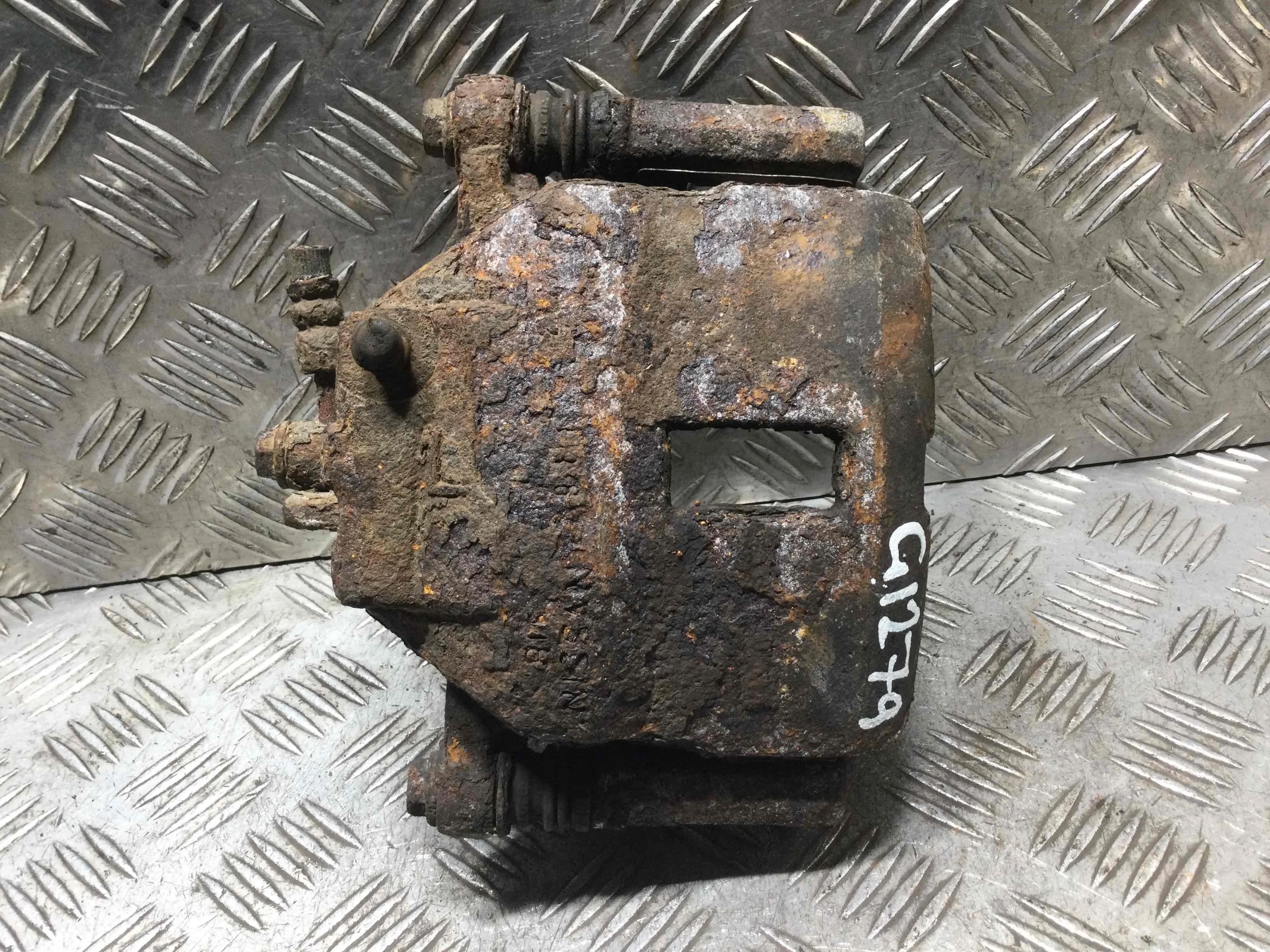 Суппорт передний левый Nissan Almera N16 (2000-2003) бензин 1.5 i Механика Х/б