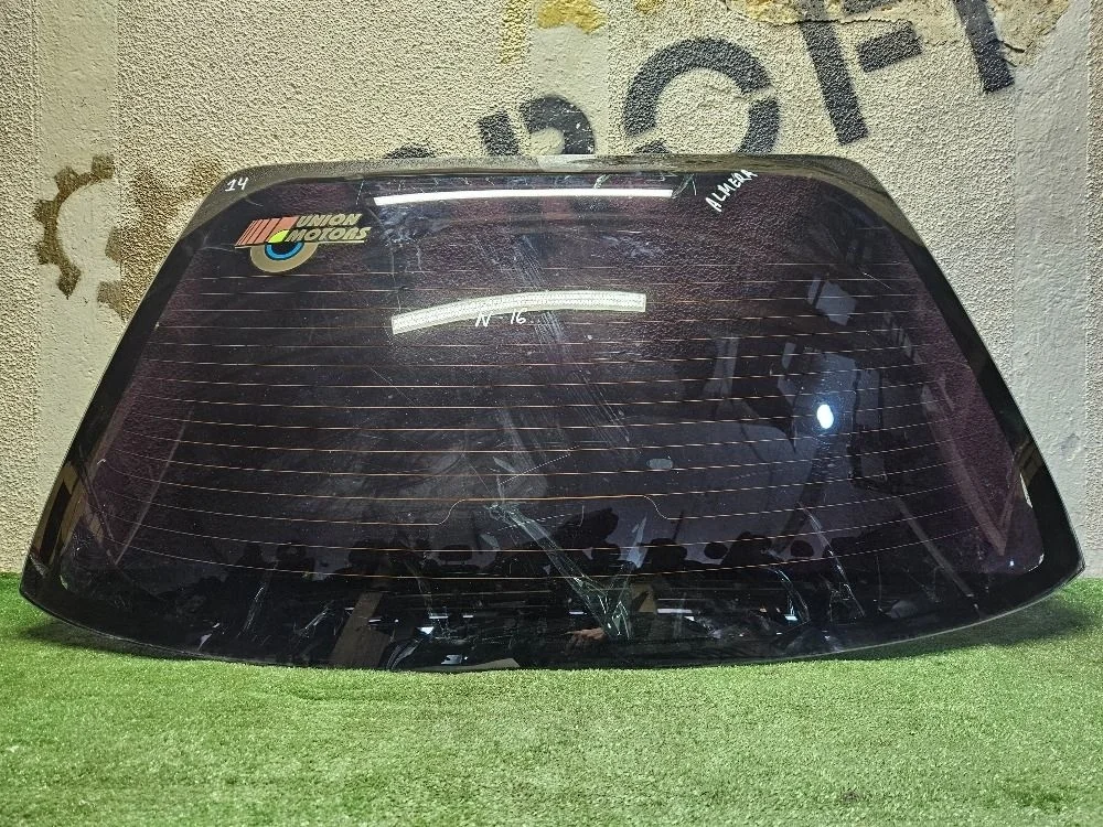 Стекло заднее на Nissan Almera N16