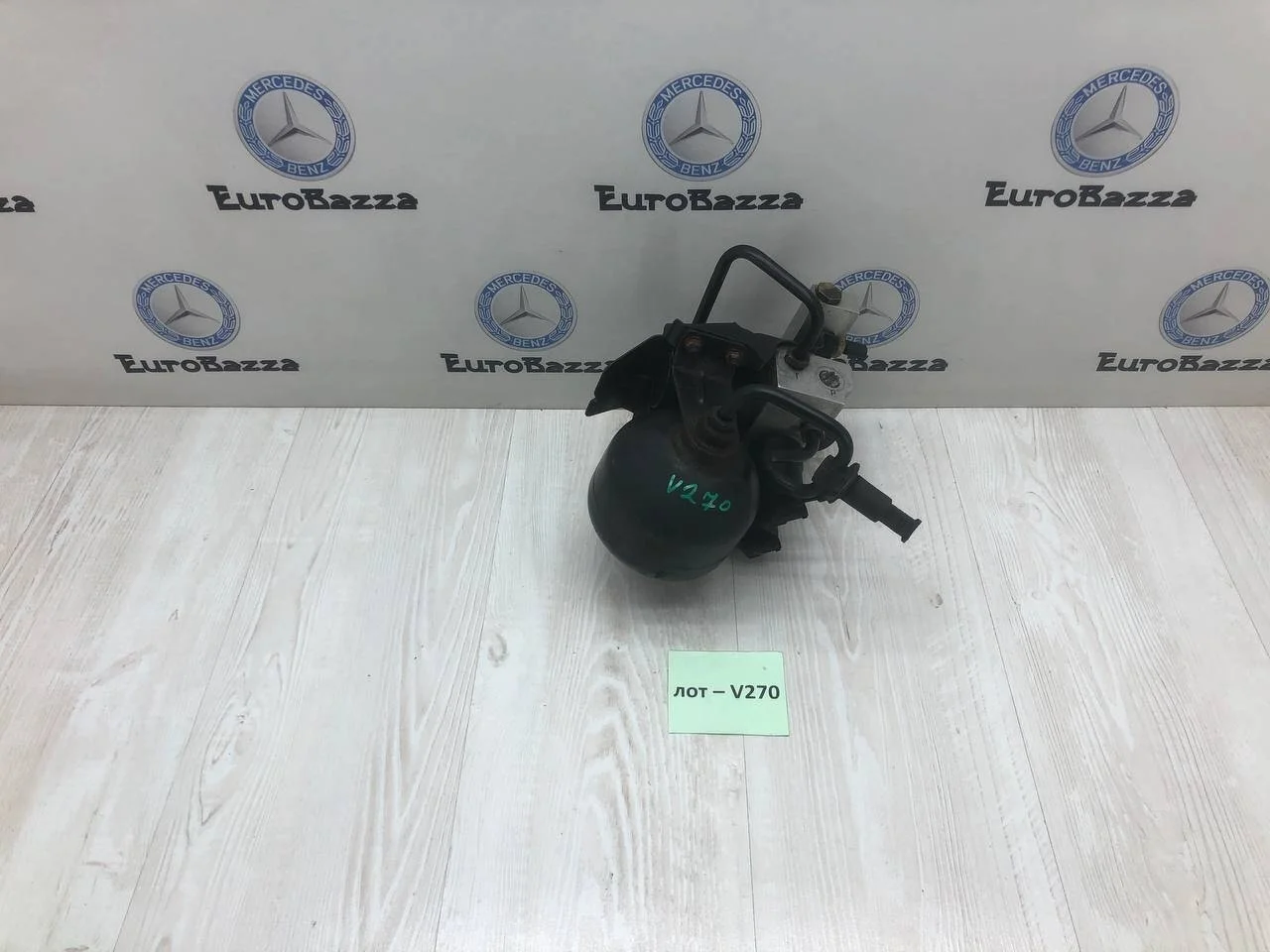 Блок клапанов гидроподвески задний Mercedes R230