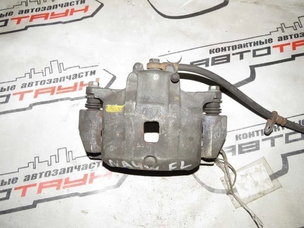 СУППОРТ В СБОРЕ MITSUBISHI ПЕРЕД ЛЕВО MN116371