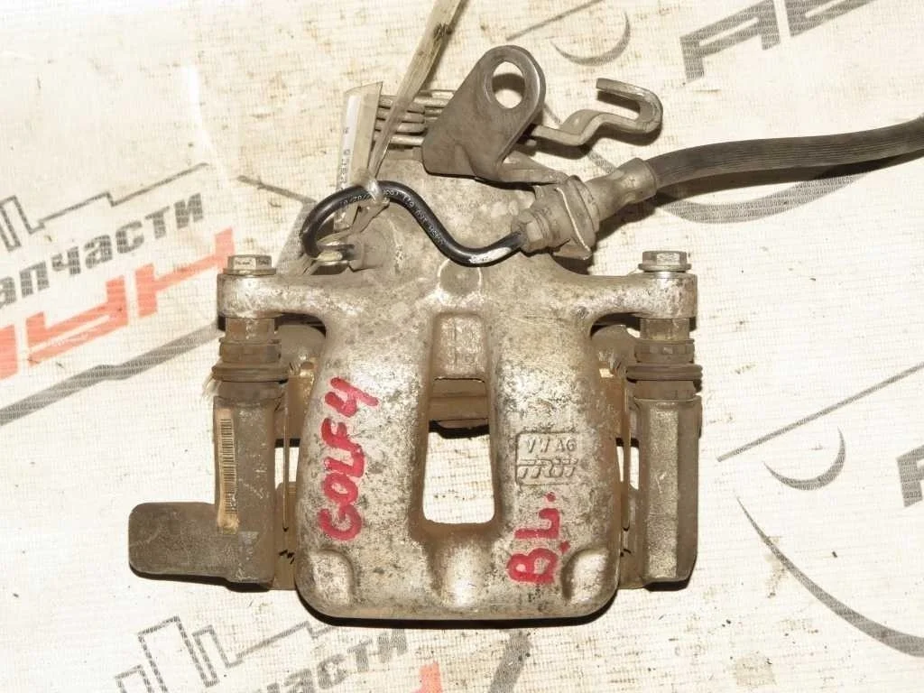 СУППОРТ В СБОРЕ AUDI VOLKSWAGEN SEAT SKODA ЗАДНИЙ ЛЕВЫЙ 1K0615423M