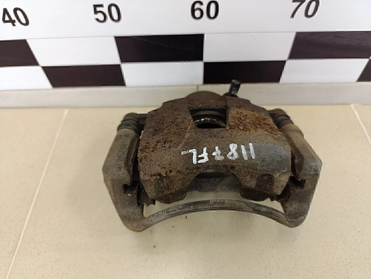 Суппорт передний левый Aveo (T200) 2003-2008