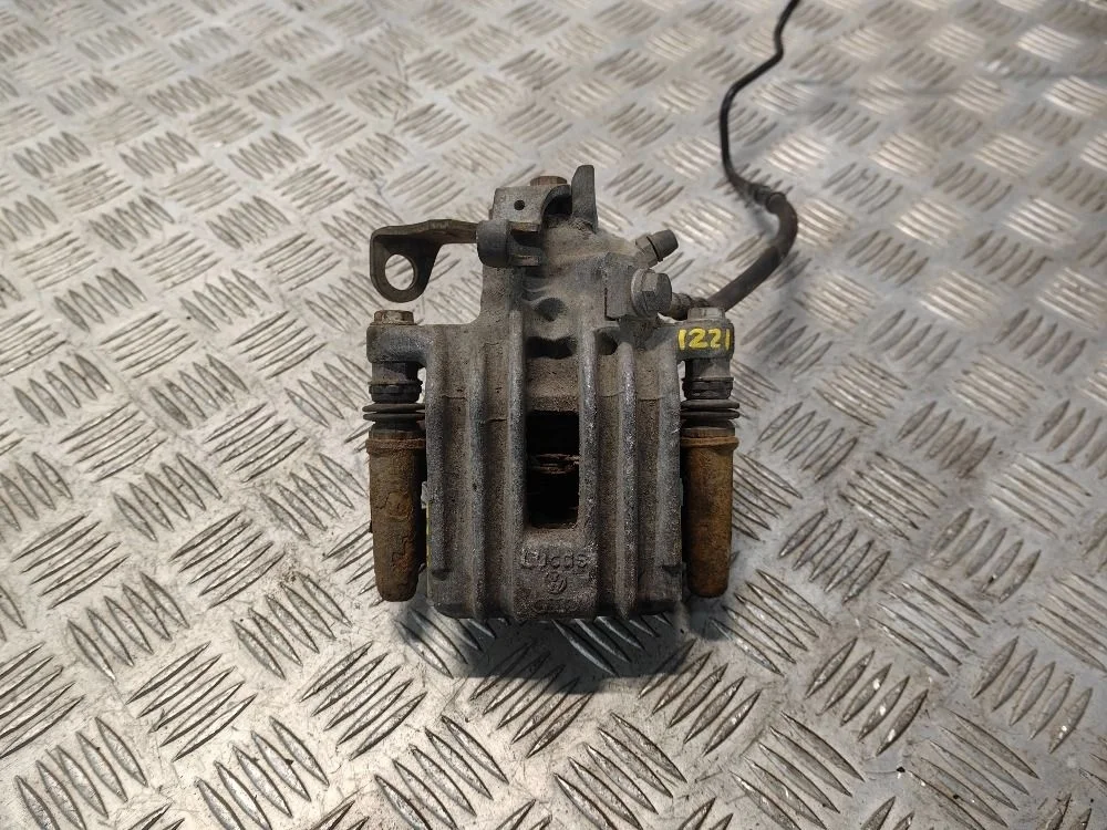 Суппорт тормозной задний правый Skoda Rapid