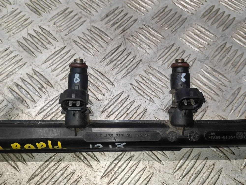 Форсунка топливная Skoda Rapid