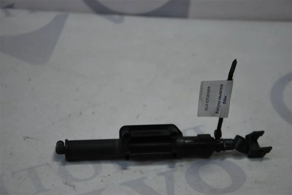 Форсунка омывателя фары