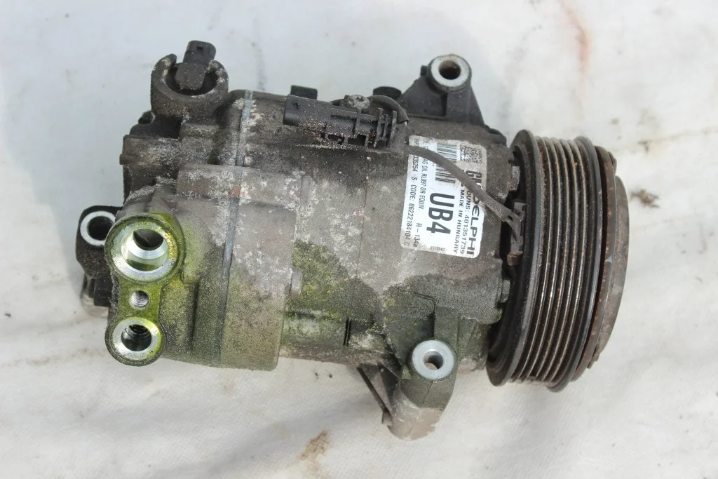 Компрессор А/С 1,6 бенз 13335254 UB4 Opel Astra J