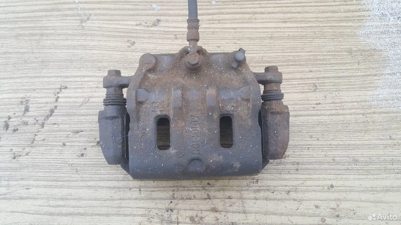 Суппорт тормозной передний левый winstorm antara