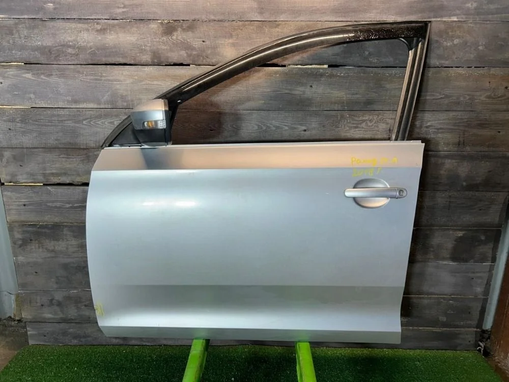 Дверь передняя левая Skoda Rapid