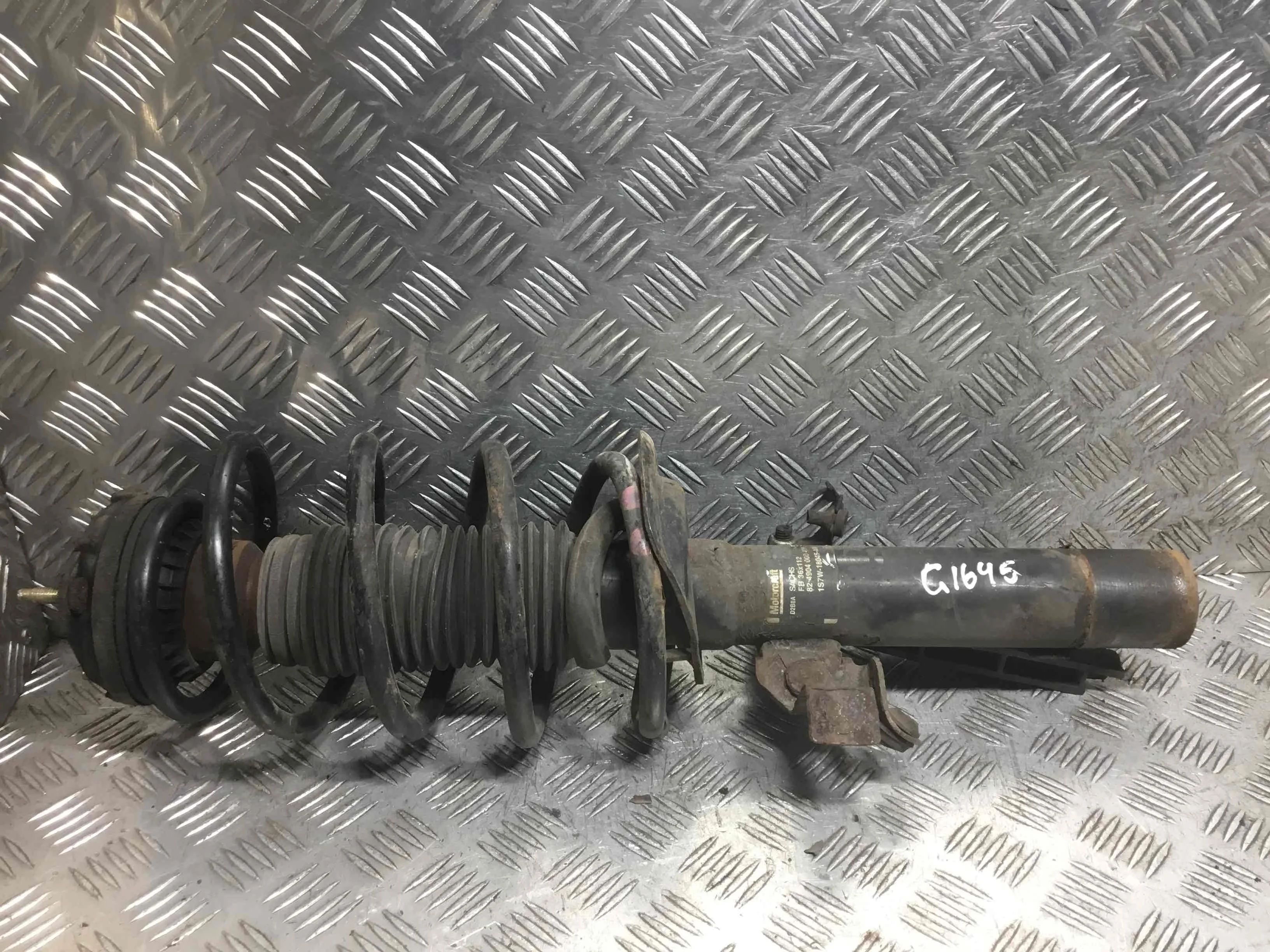 Стойка передняя левая Ford Mondeo 3 поколение [рестайлинг] (2003-2007) бензин 2.0 i Механика Х/б