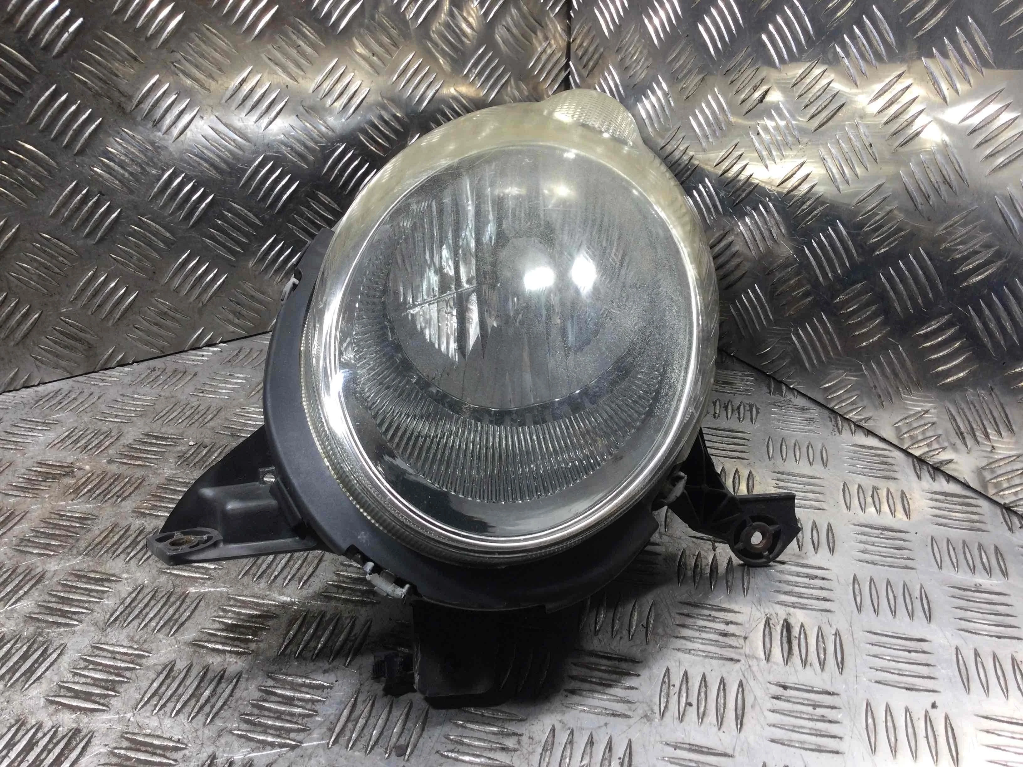 Фара левая Nissan Micra K12 (2002-2010) бензин 1.2 i Механика Х/б