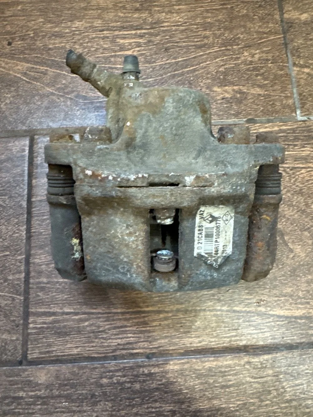 Суппорт тормозной передний правый Renault Logan I (2004—2009)