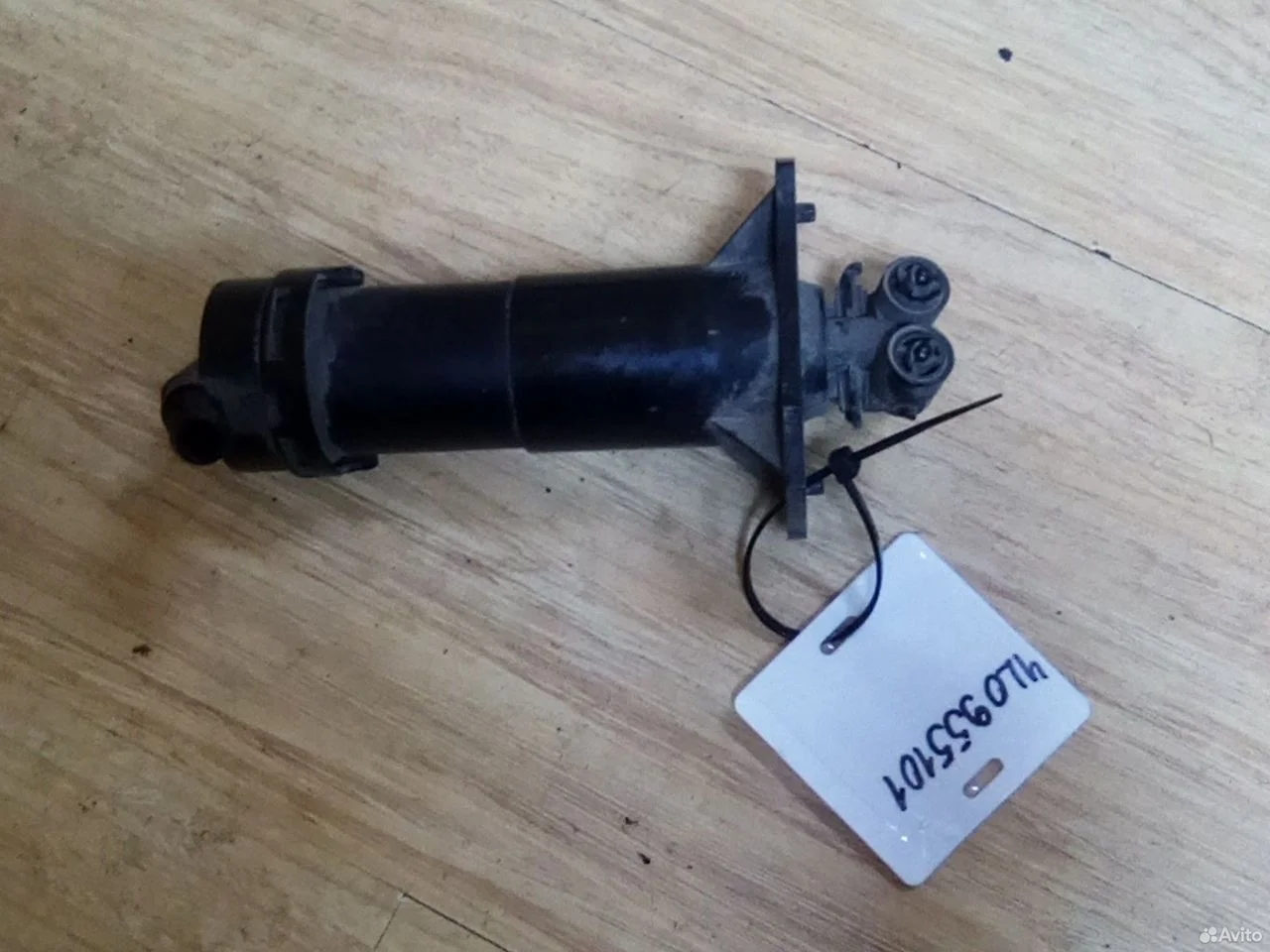 Форсунка омыватели фар левая 4l0955101