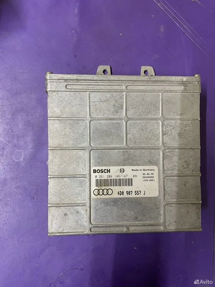 Блок управления двигателем audi a8 d2 4d0907557j