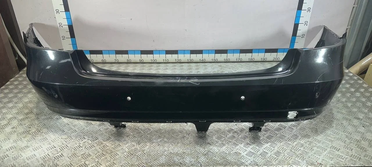 [Б/У] Бампер задний (под парктрон, до 2013г) Mercedes W212 - запаяно небольшое отверстие справа [Незначительные дефекты] [Код: 00318676 ]