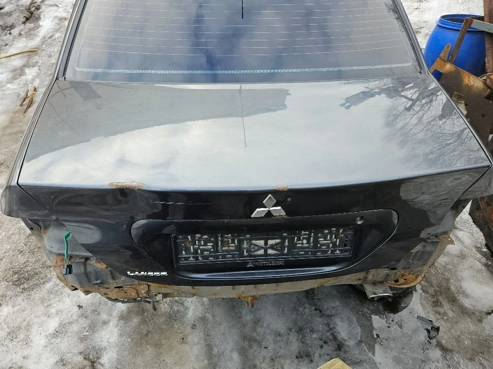 Крышка багажника дефект для Mitsubishi Lancer 9