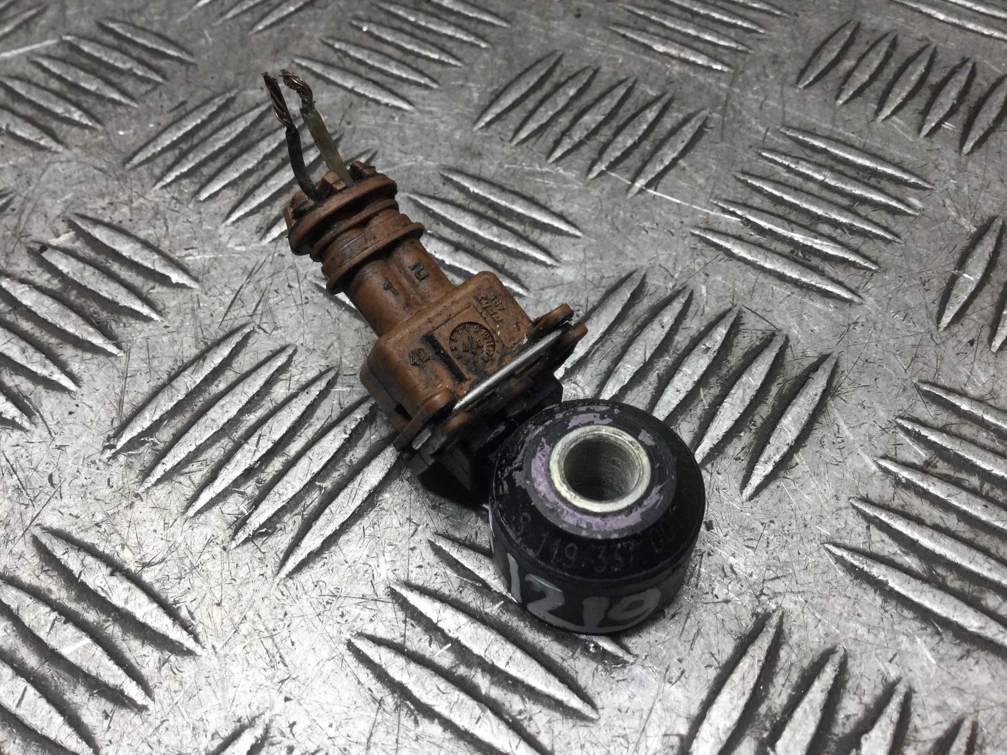 Датчик детонации Nissan Micra K12 (2002-2010) бензин 1.2 i Механика