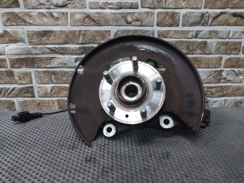 Кулак поворотный Opel Astra J