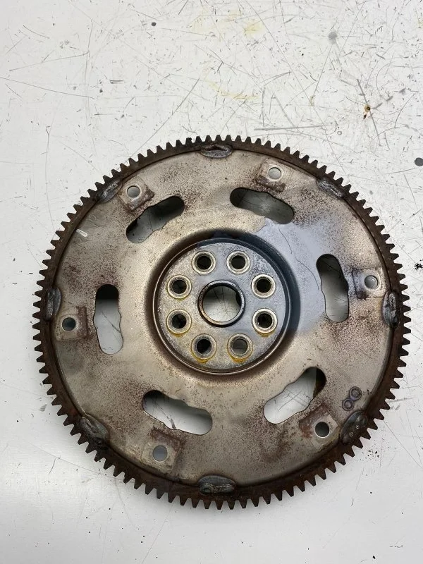 Маховик Suzuki Liana 1 2001—2006 1262054G00 M16A