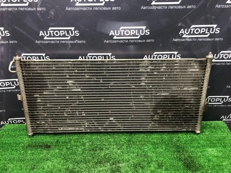 Радиатор кондиционера Nissan Primera 92100BM407 P12 QG16DE