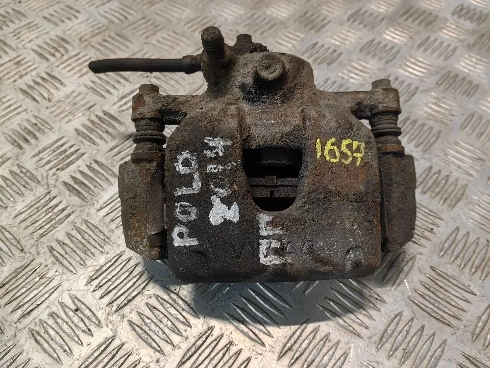 Суппорт передний правый Volkswagen Polo