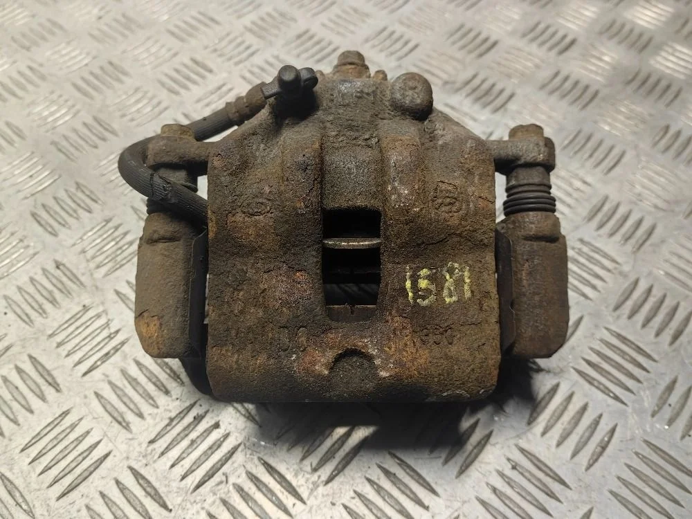 Суппорт передний правый Hyundai Solaris II