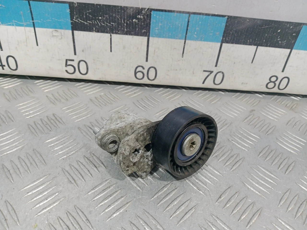 [Б/У] Натяжитель ремня [Код: 00593209 ]