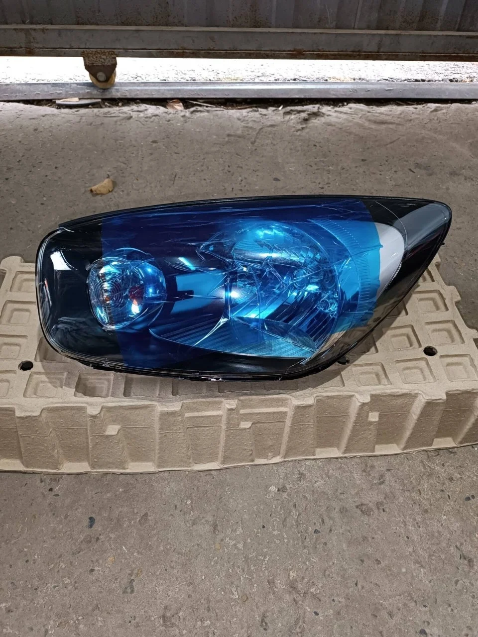 Блок фары Kia Picanto 2 921011Y010, левый