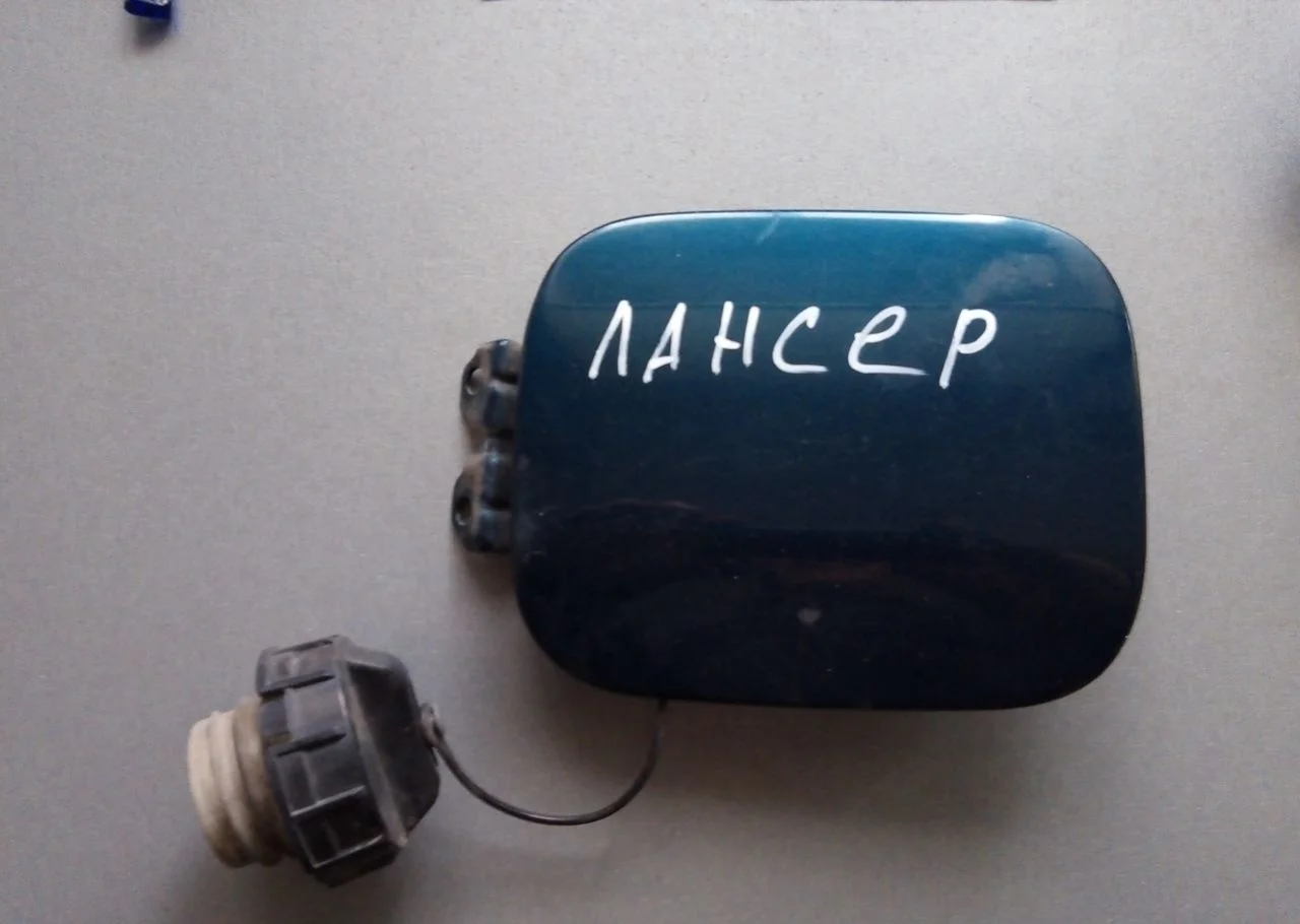 Лючок бензобака Mitsubishi Lancer 9 5940A010