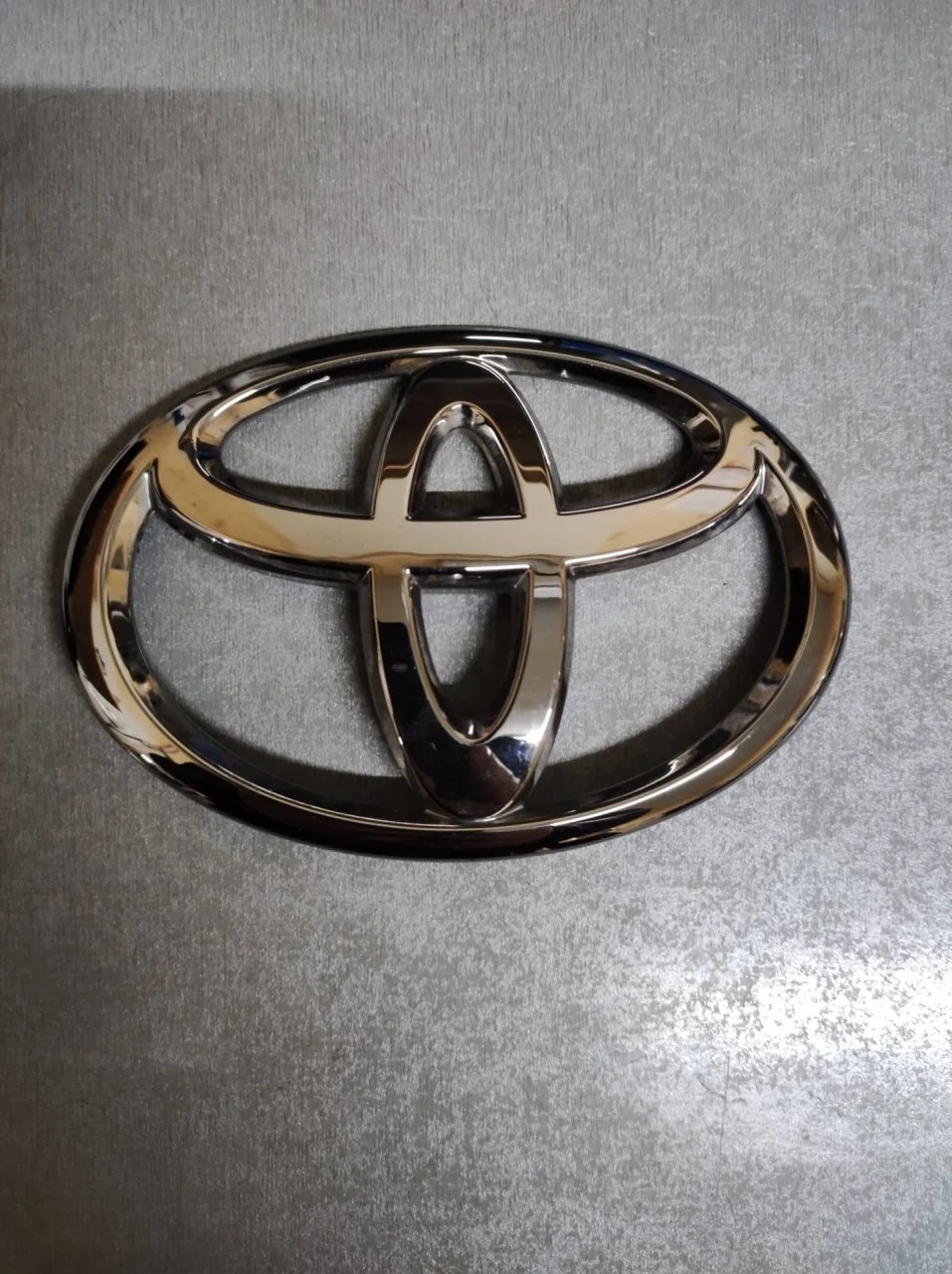 Эмблема багажника Toyota Camry 9097502127 V70