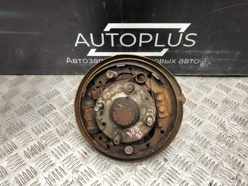 Кулак со ступицей Mazda Protege III 2002 G14T261B0 СЕДАН 1.6 ZM-DE, задний левый