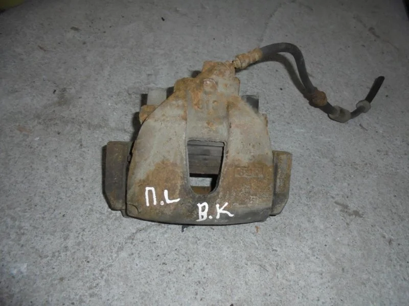 Суппорт тормозной Mazda Mazda 3 2002-2009 BPYK3371XC BK, передний левый