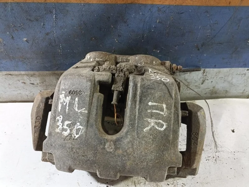 Суппорт тормозной Mercedes A1644202483, передний правый