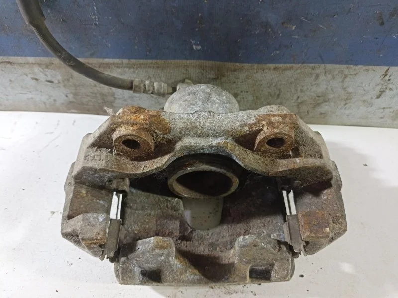 Суппорт тормозной Volkswagen Polo Sedan 2011-2020 1K0615123E, передний левый