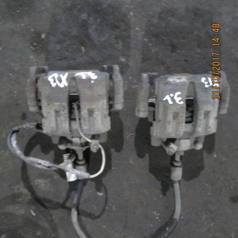 Суппорт тормозной BMW X1 (E84) 34216768697, задний левый