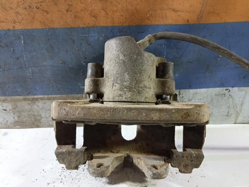 Суппорт тормозной Bmw X5 (E53) 34116773131, передний левый