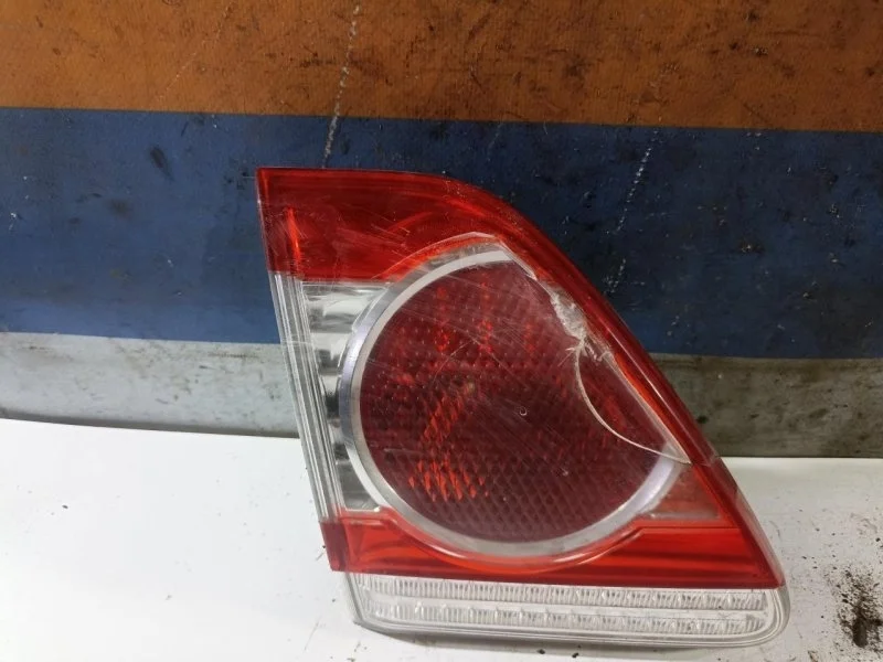 Патрон в фонарь Toyota Corolla 2006 - 2013 8159112150 E150, левый