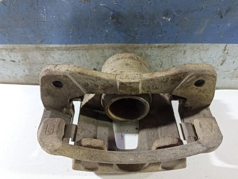 Суппорт тормозной Chevrolet Lacetti 96549789 J200, передний правый