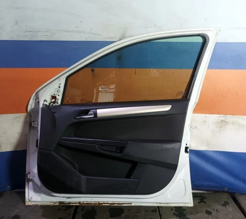 Ограничитель двери Opel Astra H 2004-2014 13107175, передний