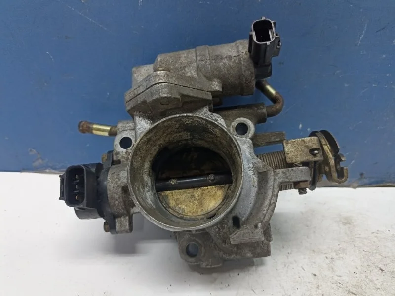 Заслонка дроссельная Mazda Demio 2002-2007 ZJ0713640 DY