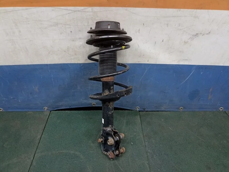 Амортизатор Subaru Impreza G12 2008 20310FG010, передний левый