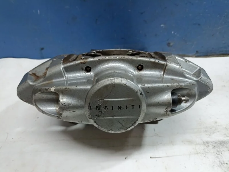 Суппорт тормозной Infiniti FX35 2012 44011JL02A, задний левый