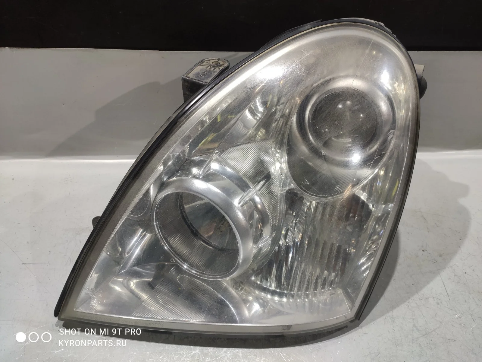 Фара SsangYong Rexton 2008 Y250