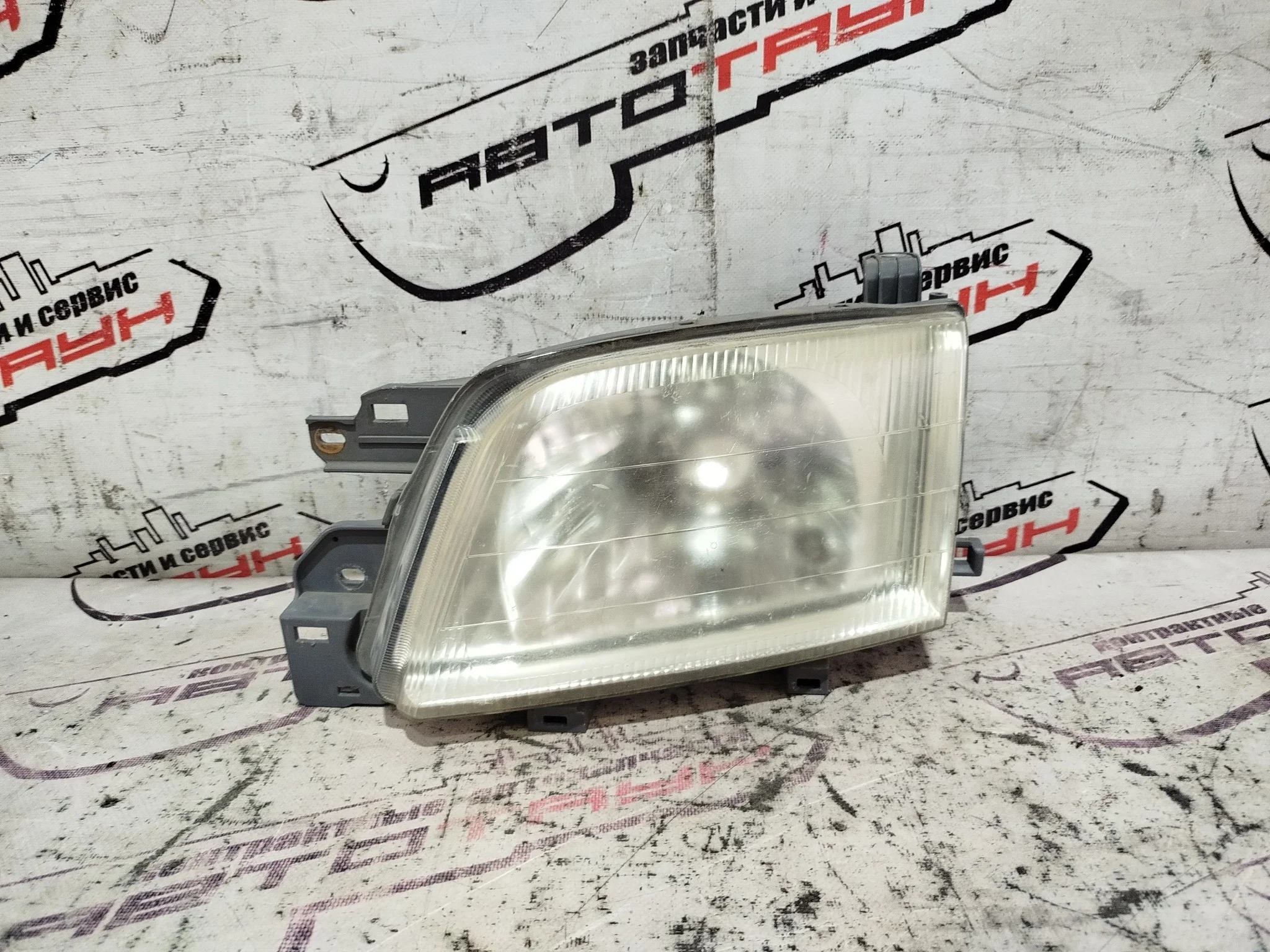 ФАРА SUBARU ЛЕВО 84001FC250 TE115