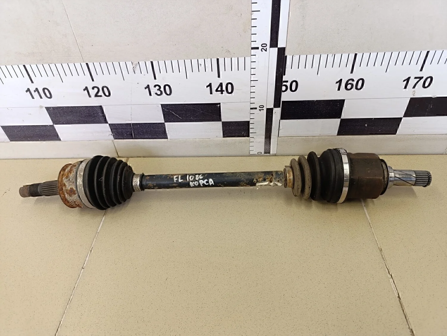 Полуось передняя левая Corsa D 2006-2015