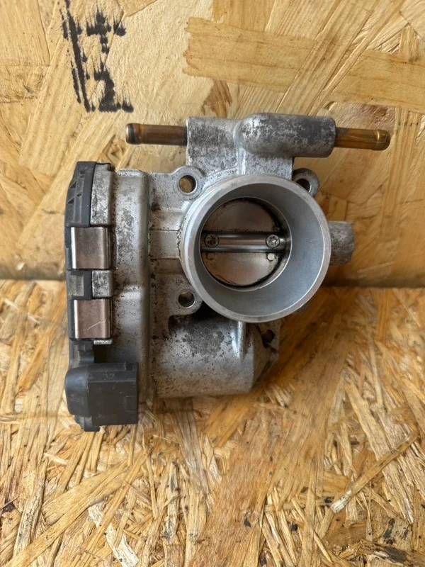 Дроссельная заслонка Opel Corsa D