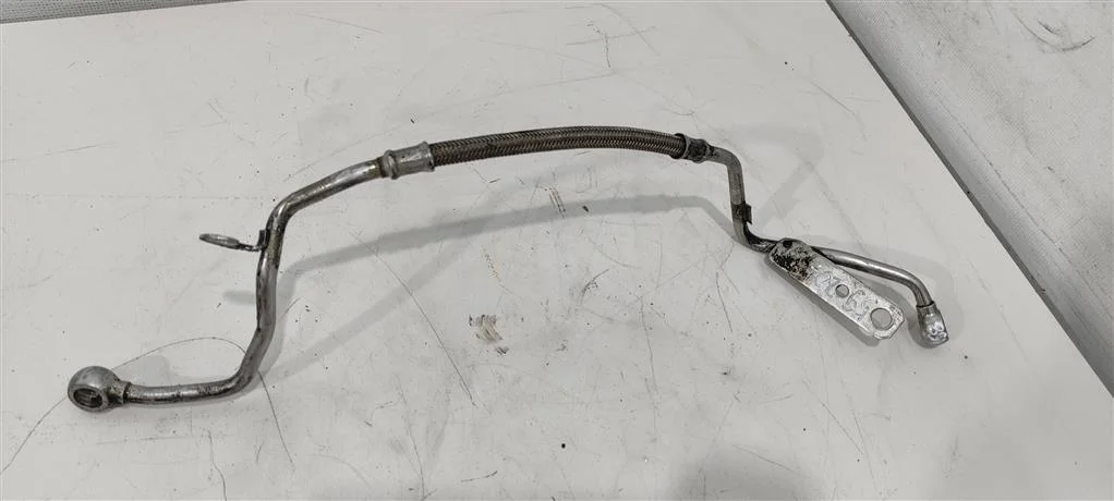 Масляная трубка турбины 06A145778Q  1.8 Турбо бен