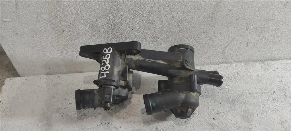 Корпус термостата 03C121111T  1.4 TSI Volkswagen