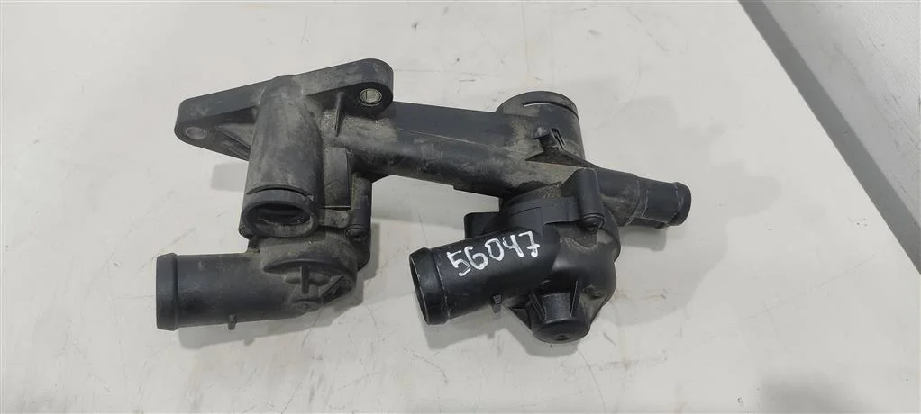 Корпус термостата 03C121111T  1.4 TSI Volkswagen