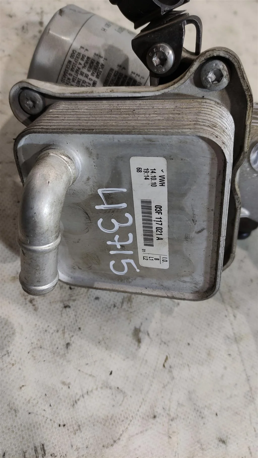 Радиатор масляный 03F117021A  1.2 TSI Volkswagen